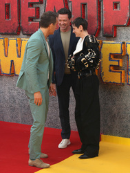 Ryan Reynolds, Hugh Jackman and Emma Corrin 